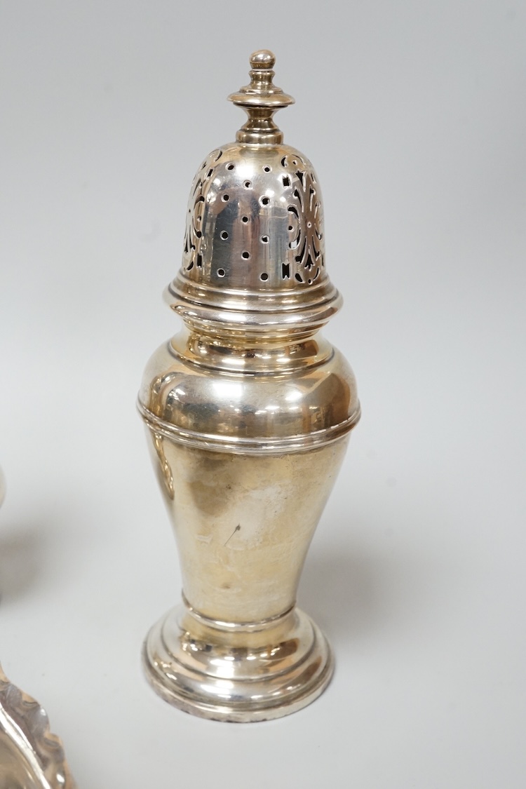 Two George V silver sauceboats, one by Asprey & Co, a silver pepperette, a silver bowl and a modern silver sugar caster, 16oz.